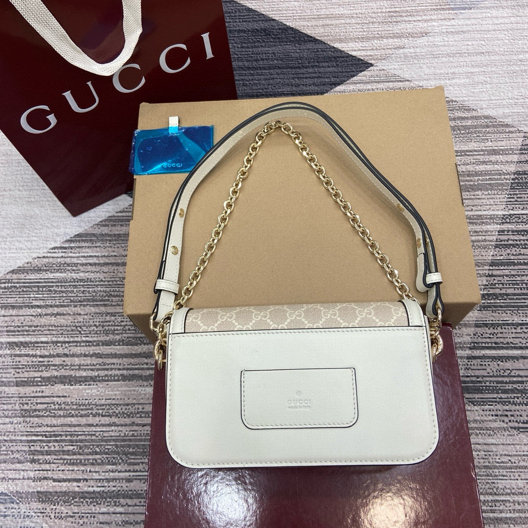 Bolso de Hombro Gucci GG Marmont Matelassé Mini en Lona GG y Piel