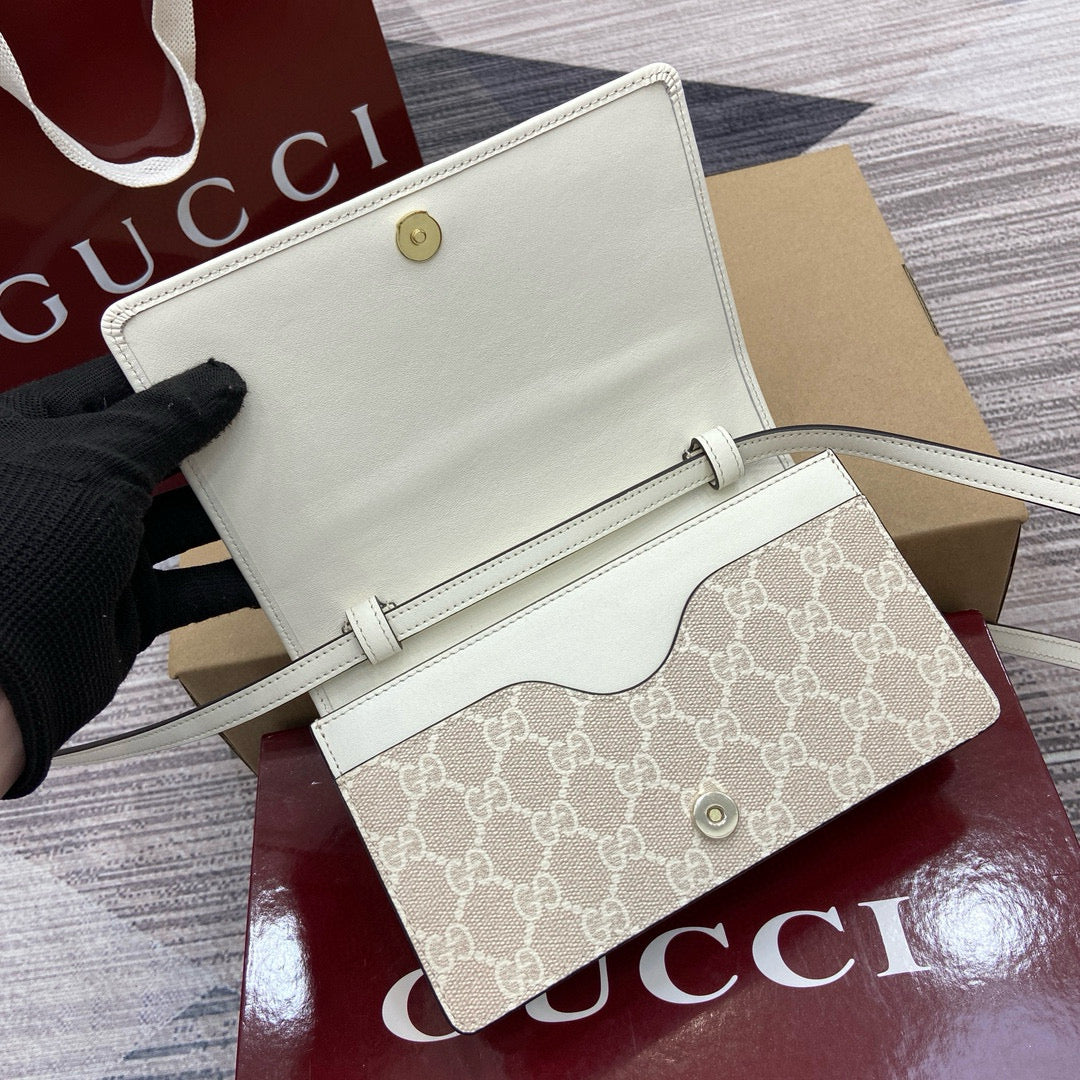 Mini Mochila Gucci Ophidia con Monogram GG y Detalles en Piel Marrón
