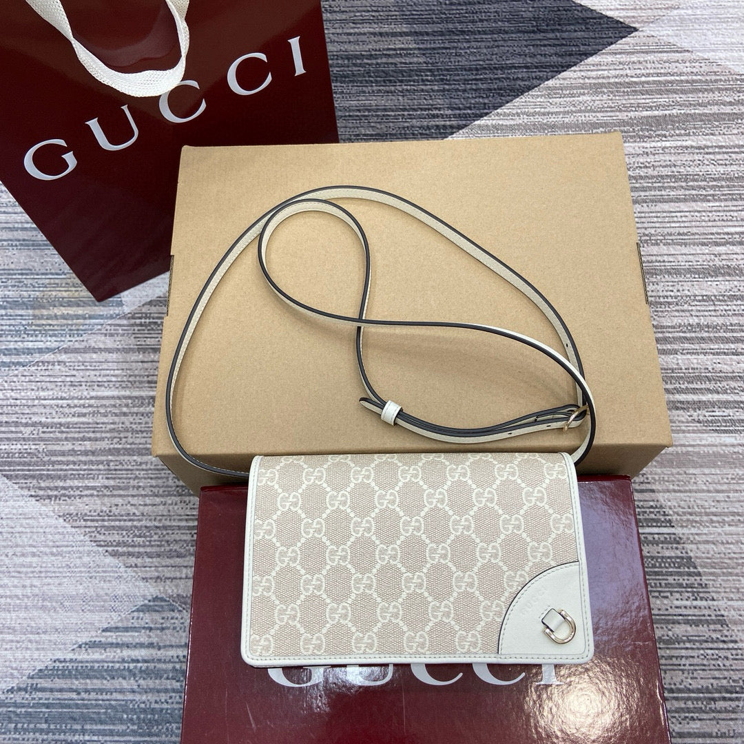 Mini Mochila Gucci Ophidia con Monogram GG y Detalles en Piel Marrón