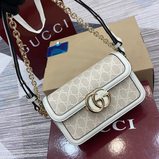 Bolso de Hombro Gucci GG Marmont Matelassé Mini en Lona GG y Piel